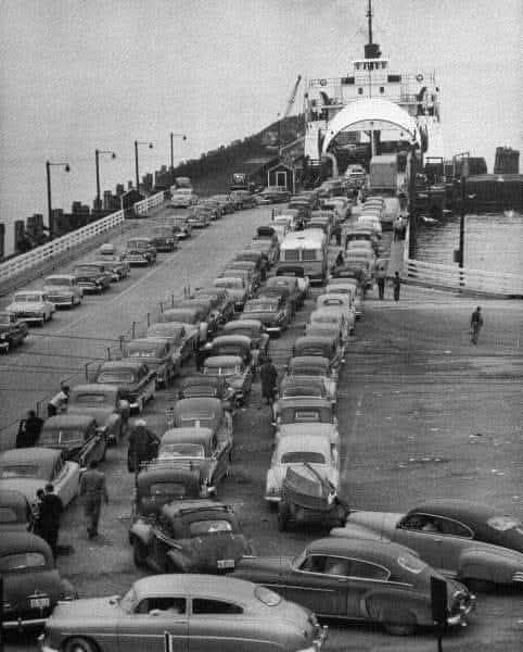 This photograph of the Mackinaw Straits Ferry, which shuttled people back and forth between the upper and lower peninsulas of Michigan, was taken in 1950. This is how it was before the Mackinac bridge opened on November 1, 1957 and ended decades of the two peninsulas being solely linked by ferries. A year later, the bridge was formally dedicated as the “world’s longest suspension bridge between anchorages.